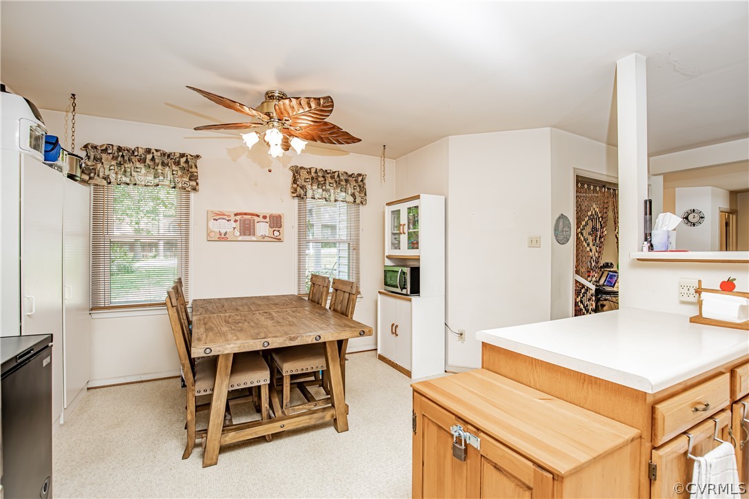 12137 Quito Road Midlothian, VA 23112 - Photo 15 of 34 a living room with stainless steel appliances furniture and a kitchen view