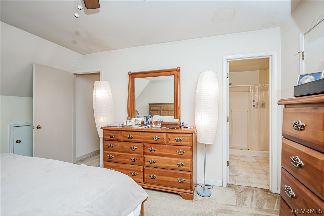 12137 Quito Road Midlothian, VA 23112 - Photo 23 of 34 a bedroom with a bed and a dresser