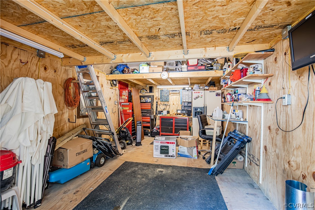 12137 Quito Road Midlothian, VA 23112 - Photo 32 of 34 a view of a storage room with a lot of stuff