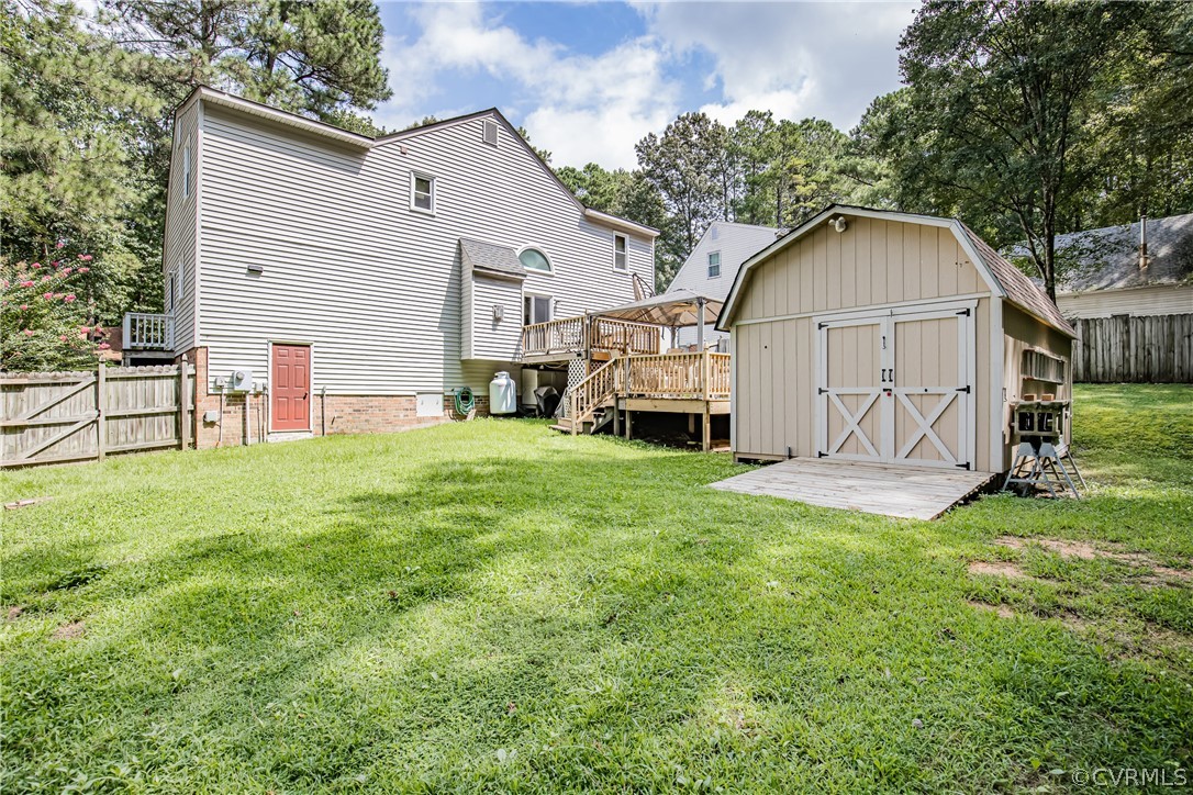 12137 Quito Road Midlothian, VA 23112 - Photo 33 of 34 a view of backyard with garden