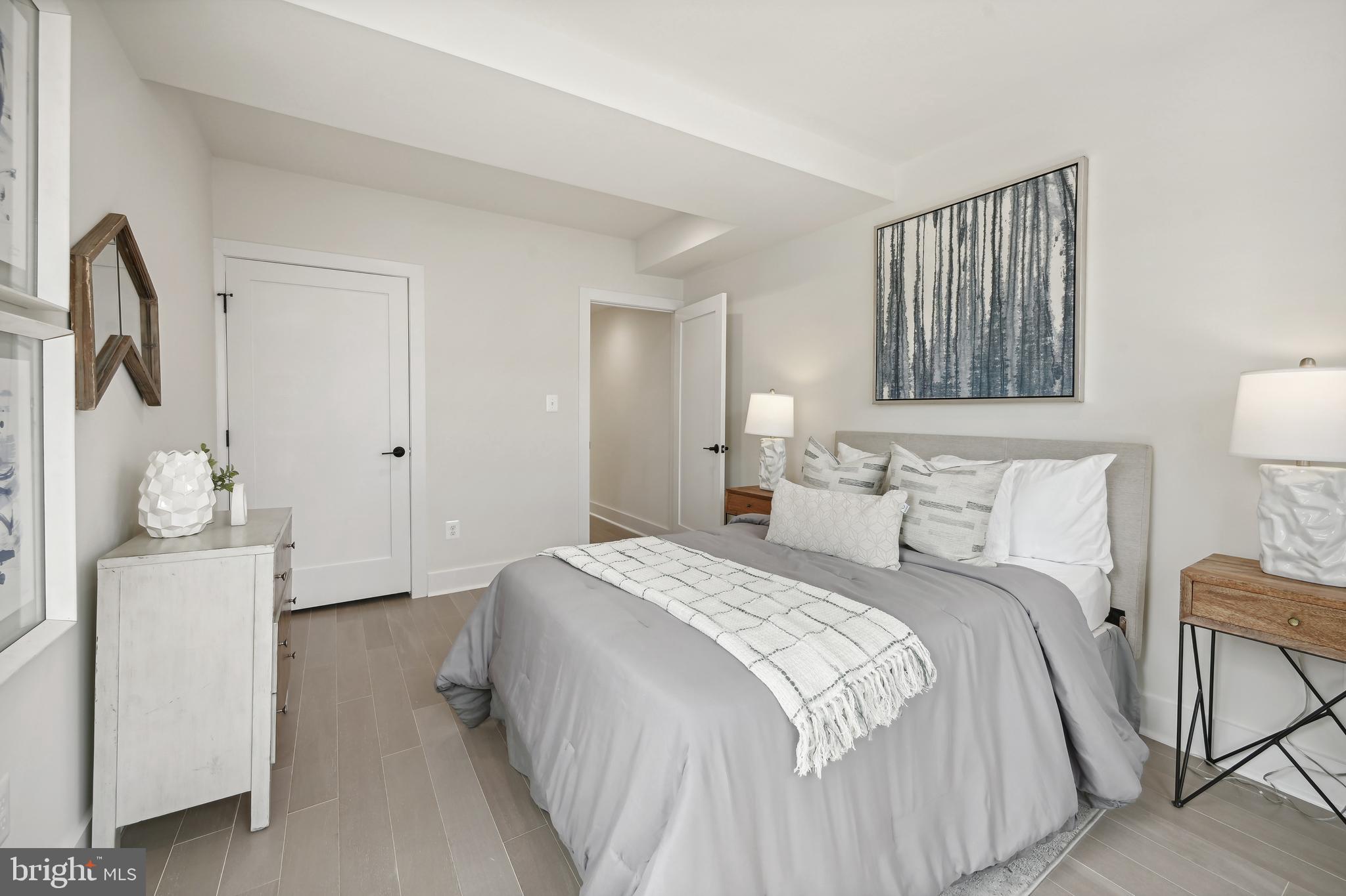 3657 13th Street Northwest Washington, DC 20010 - Photo 14 of 35 a bedroom with a bed and a couch