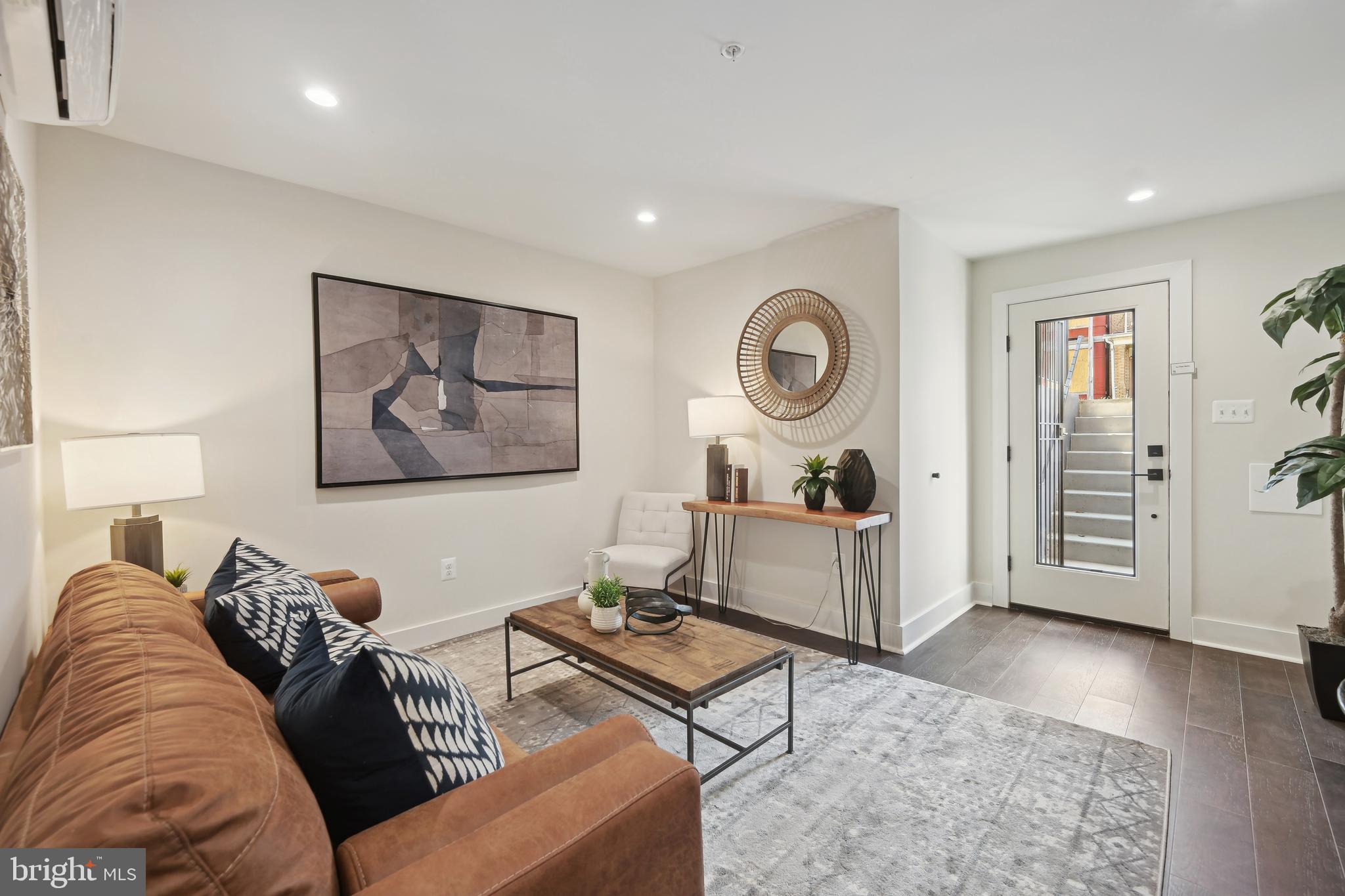 3657 13th Street Northwest Washington, DC 20010 - Photo 22 of 35 a living room with furniture and a window