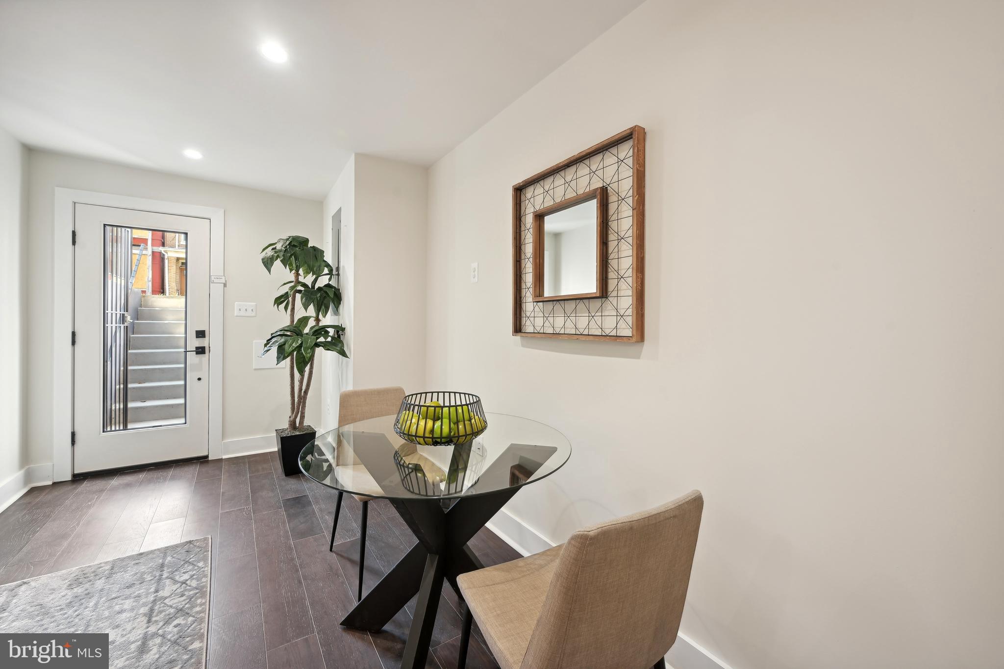 3657 13th Street Northwest Washington, DC 20010 - Photo 23 of 35 a living room with furniture and a potted plant