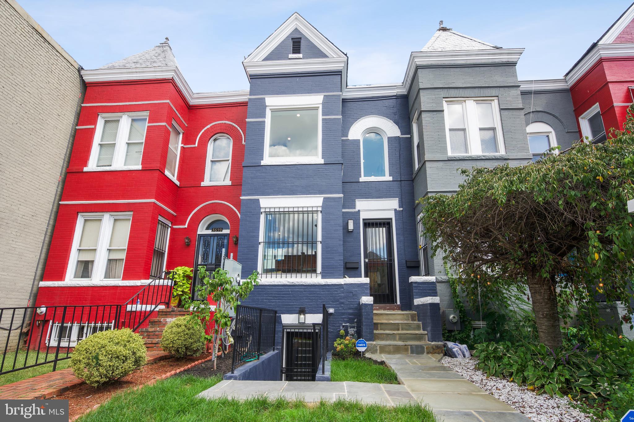 3657 13th Street Northwest Washington, DC 20010 - Photo 34 of 35 a front view of multi story residential apartment building with yard