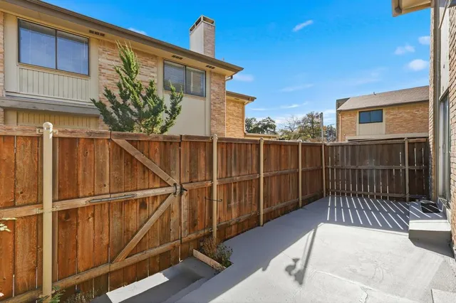 a view of a balcony with door