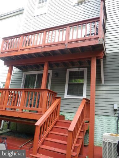 8222 Maple Ridge Avenue Springfield, VA 22153 - Photo 6 of 15 a view of entryway with a balcony