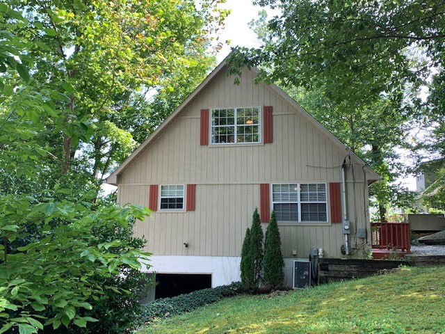 323 Cosby Parris Road Byrdstown, TN 38549 - Photo 22 of 28 a front view of house with yard and green space