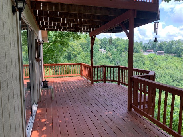 323 Cosby Parris Road Byrdstown, TN 38549 - Photo 25 of 28 a view of porch with wooden floor