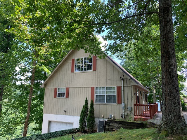 323 Cosby Parris Road Byrdstown, TN 38549 - Photo 26 of 28 a view of house with backyard