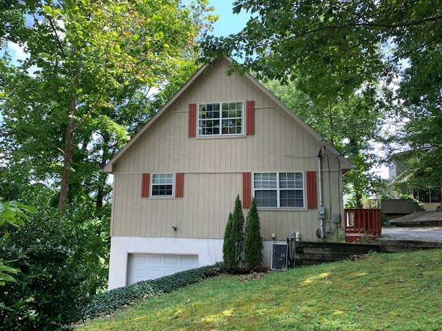 323 Cosby Parris Road Byrdstown, TN 38549 - Photo 27 of 28 a front view of house with yard and green space