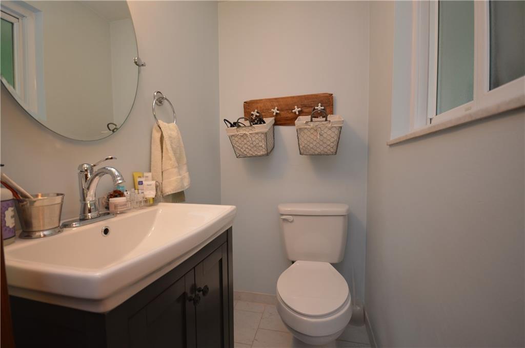 226 Hillendale Road Pittsburgh, PA 15237 - Photo 13 of 25 a bathroom with a toilet sink and mirror