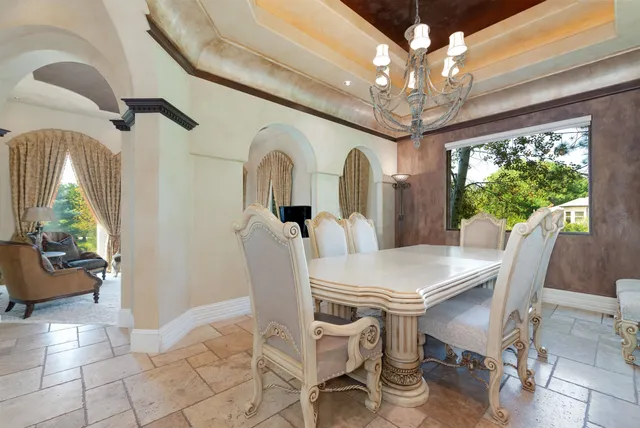 a view of a dining room with furniture window and outside view