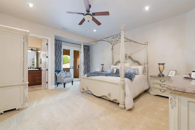 a bed room with a bed and furniture