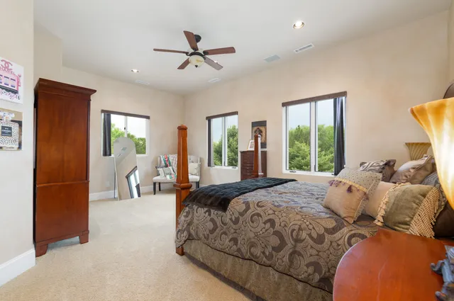 a bed room with a bed and a window