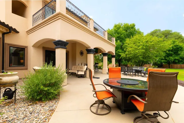a aerial view of a house with swimming pool and garden
