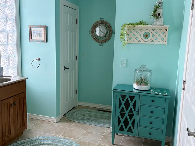 a view of a hallway with closet