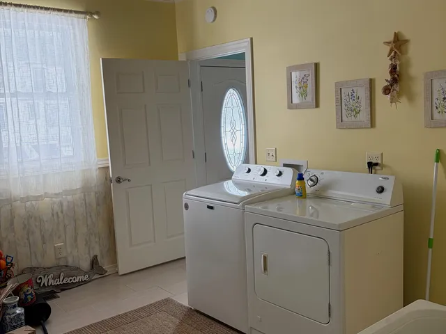 a utility room with dryer and washer