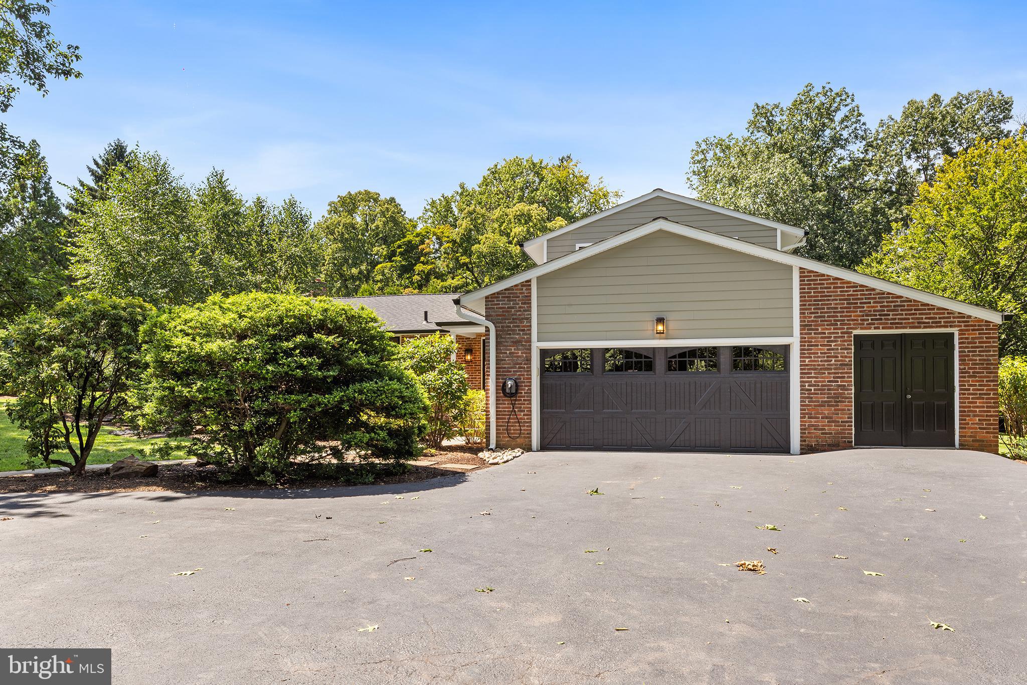 attached 2 car garage parking with EV charger