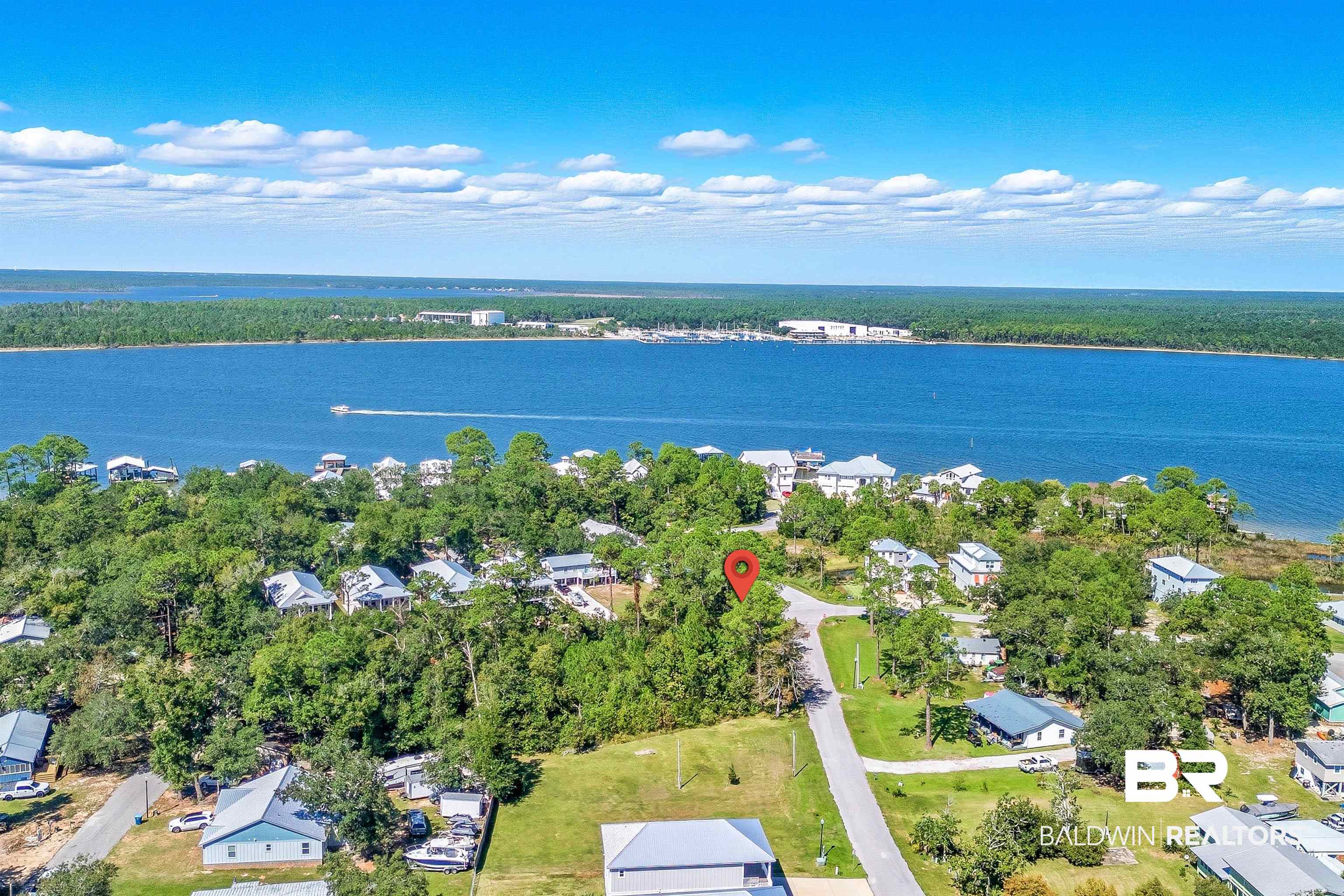 5310 Pine Road Orange Beach, AL 36561 - Photo 5 of 46 Aerial view of residential area with a nearby body of water