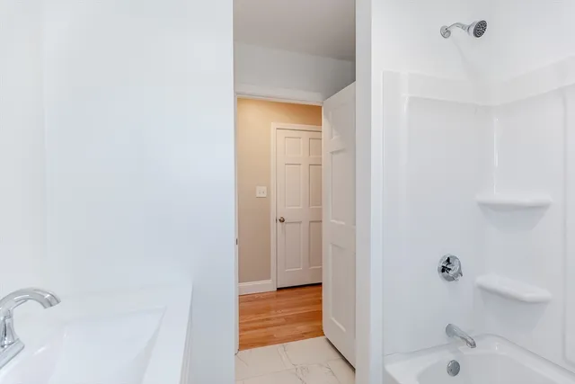 a bathroom with a bathtub