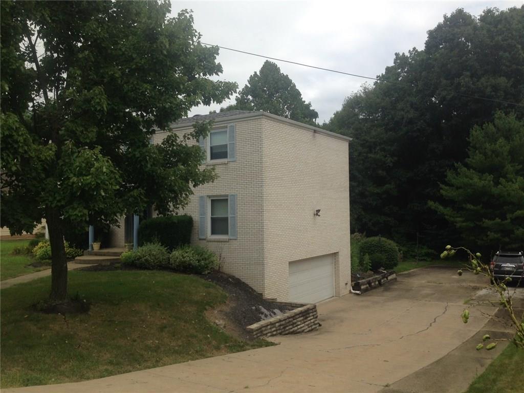 2462 Saunders Station Road Monroeville, PA 15146 - Photo 5 of 17 large driveway and level rear yard