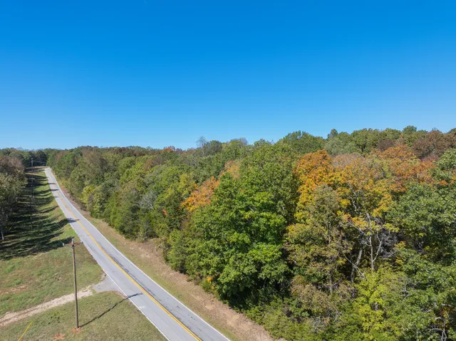 a view of a kitchen with large window