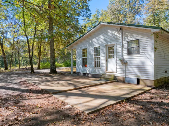 a view of a yard in front of a house