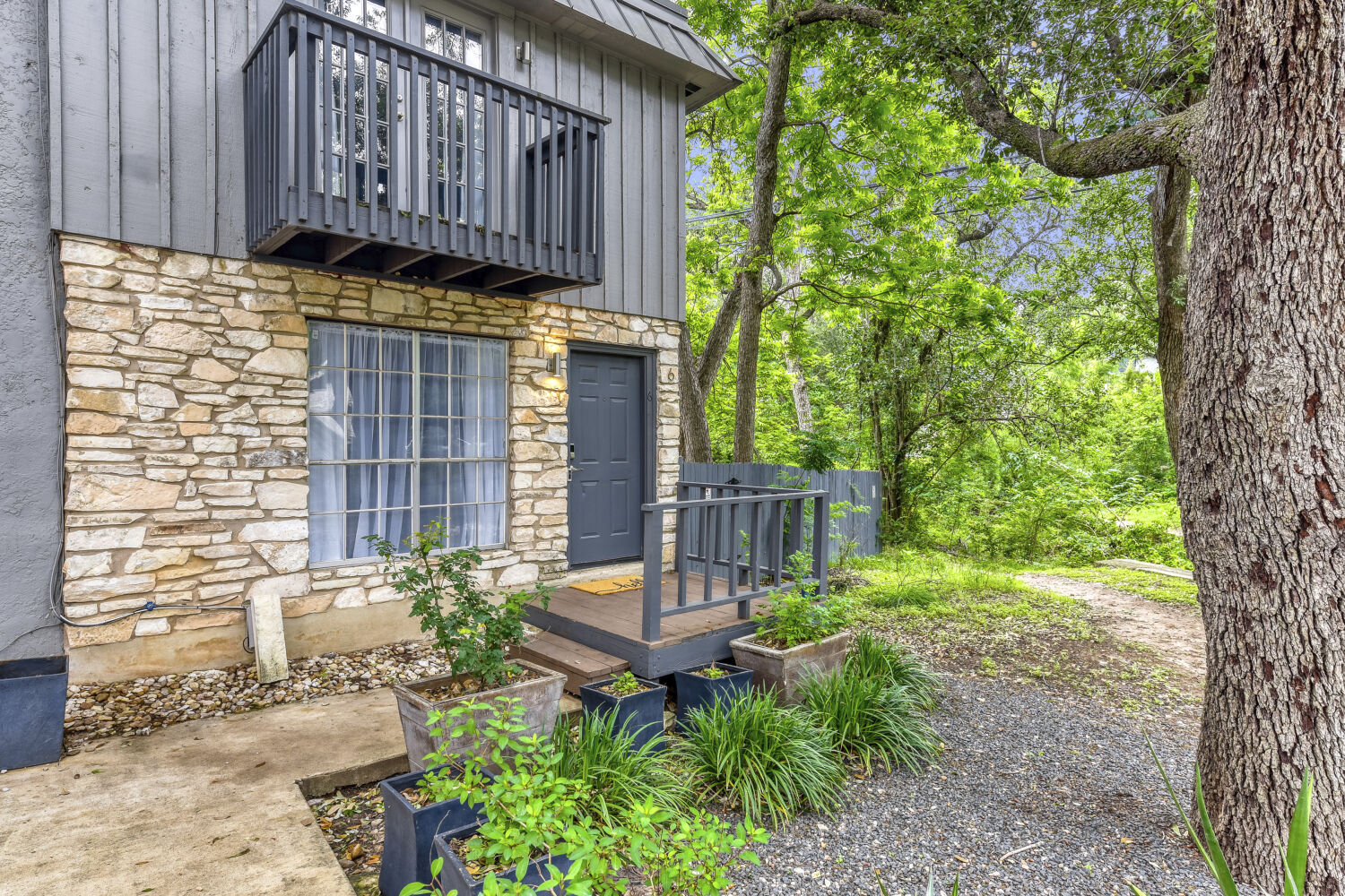 1912 Lightsey Road, Unit 6 Austin, TX 78704 - Photo 1 of 27 a view of a house with backyard and sitting area