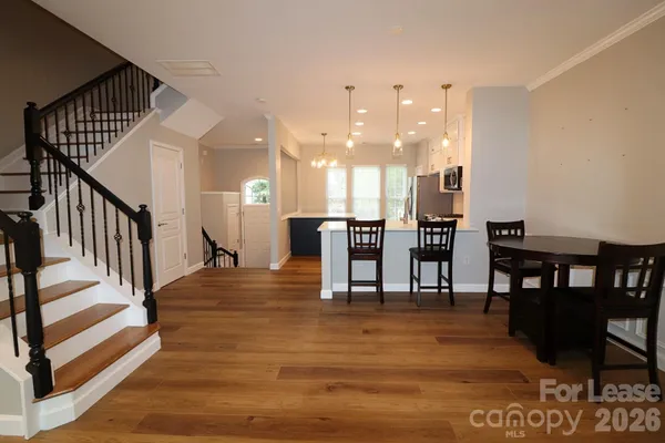 a view of a room with furniture and a fireplace
