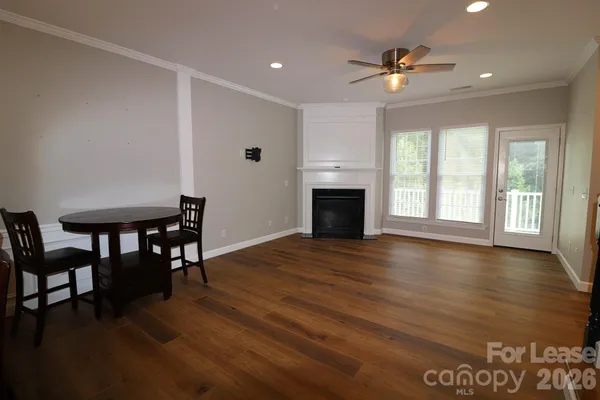 a view of a livingroom with wooden floor