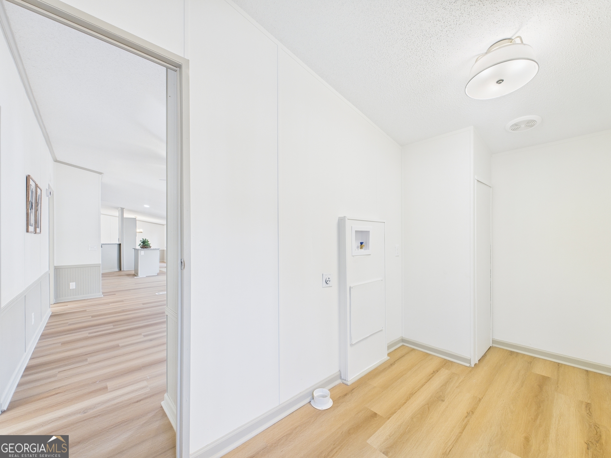 1669 Henderson Road Macon, GA 31217 - Photo 21 of 48 a view of a room with wooden floor and bathroom