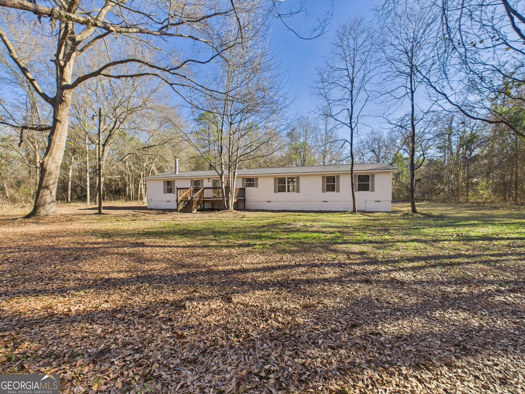 1669 Henderson Road Macon, GA 31217 - Photo 41 of 48 a view of a house with a yard