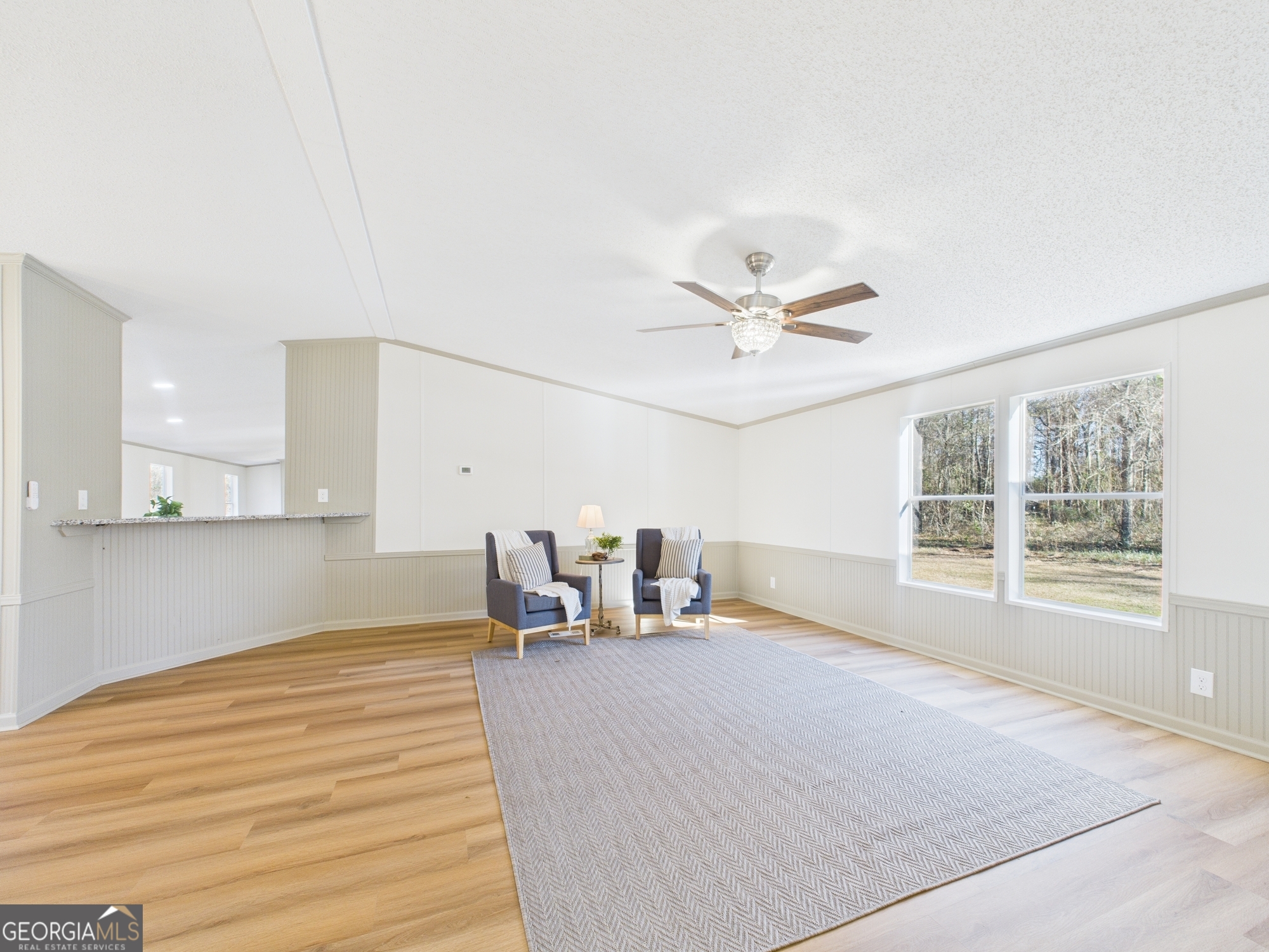 1669 Henderson Road Macon, GA 31217 - Photo 5 of 48 a view of an empty room with a window