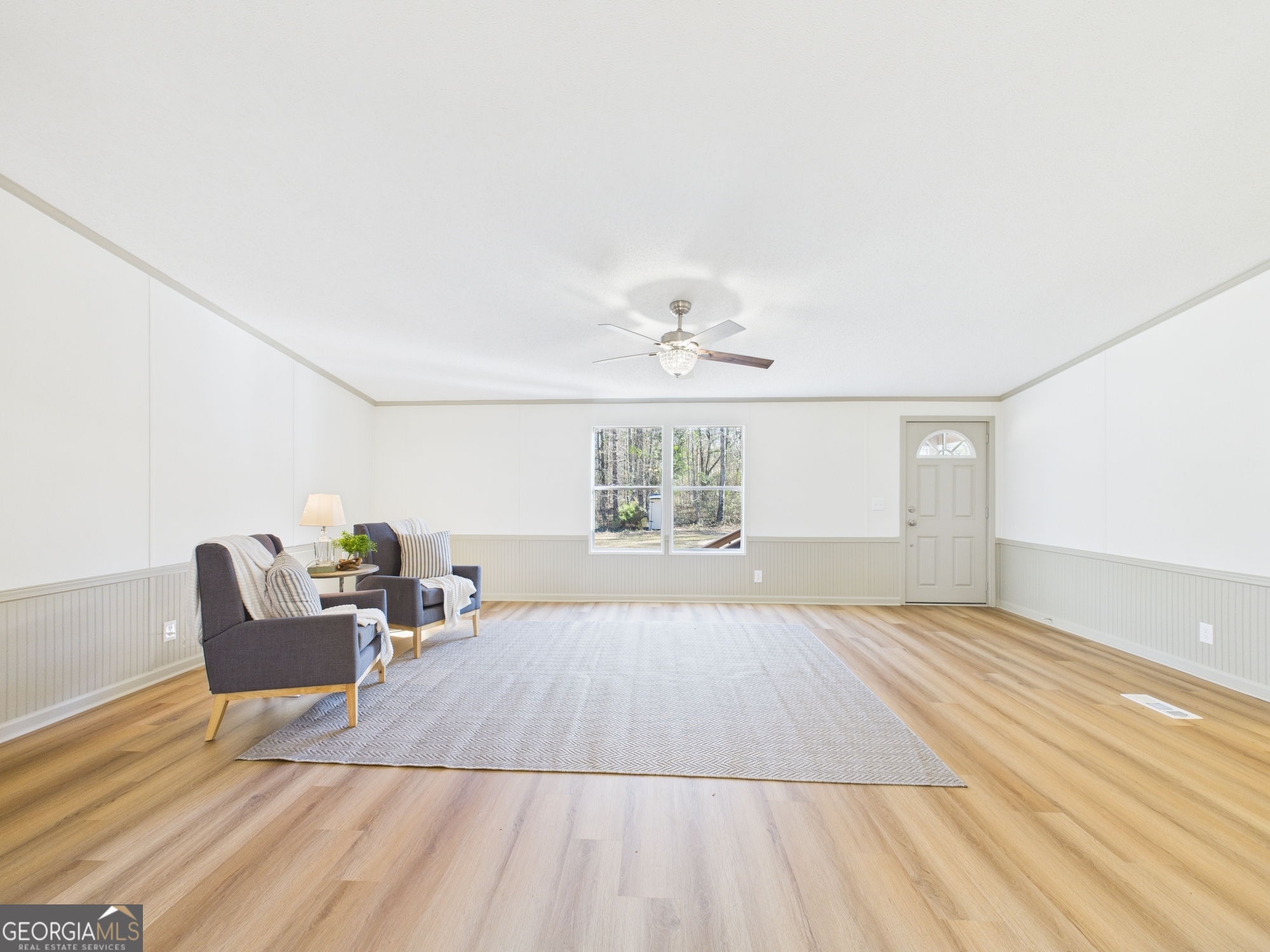 1669 Henderson Road Macon, GA 31217 - Photo 7 of 48 a living room with furniture and a window