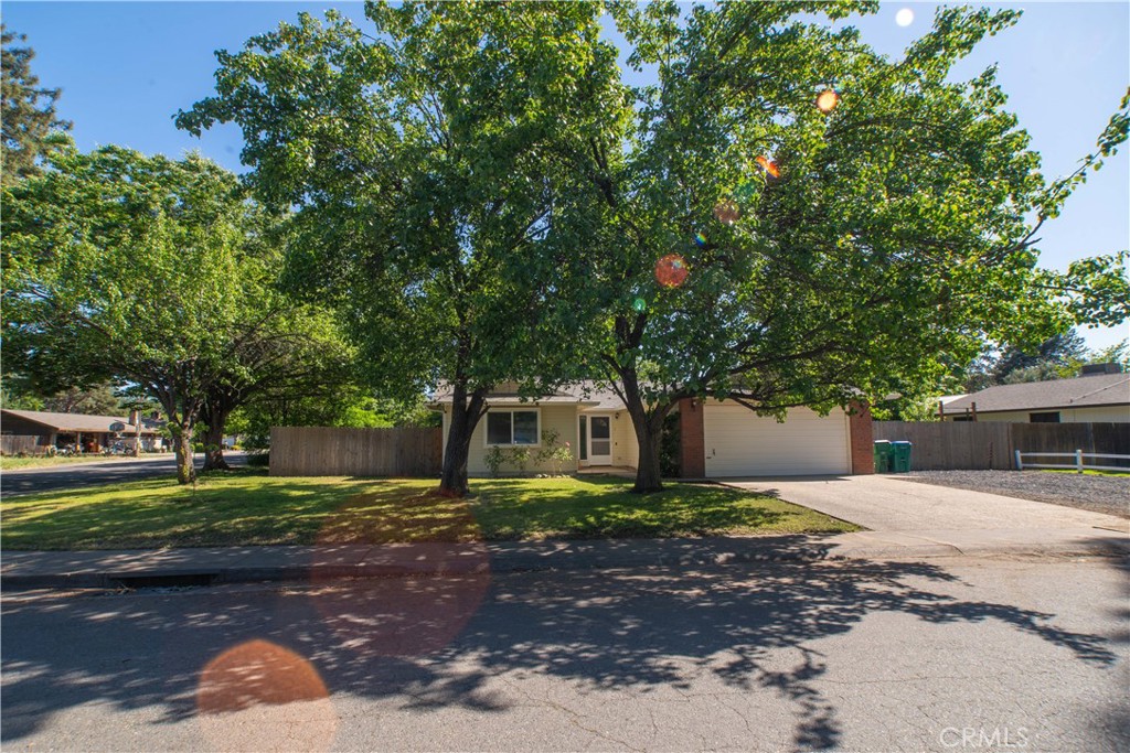 1 San Ramon Drive Chico, CA 95973 - Photo 42 of 42 a front view of a house with a yard and tree s