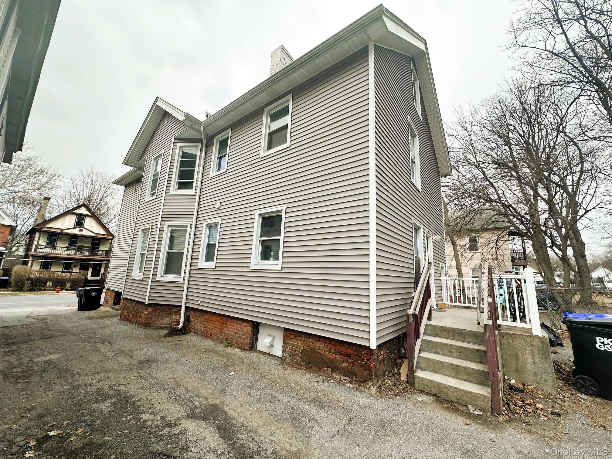 197 North Hamilton Street, Unit 2 Poughkeepsie, NY 12601 - Photo 11 of 12 Driveway to parking and back yard.