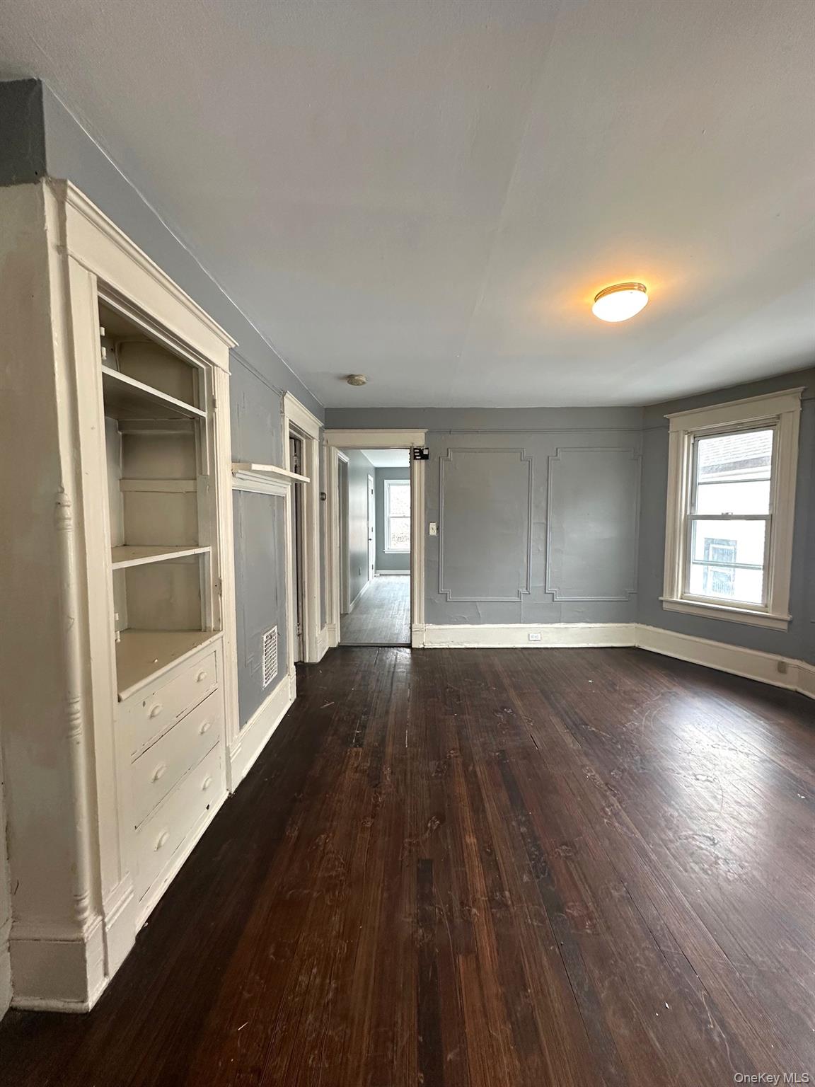 197 North Hamilton Street, Unit 2 Poughkeepsie, NY 12601 - Photo 4 of 12 Large living room with built-ins and lots of light.