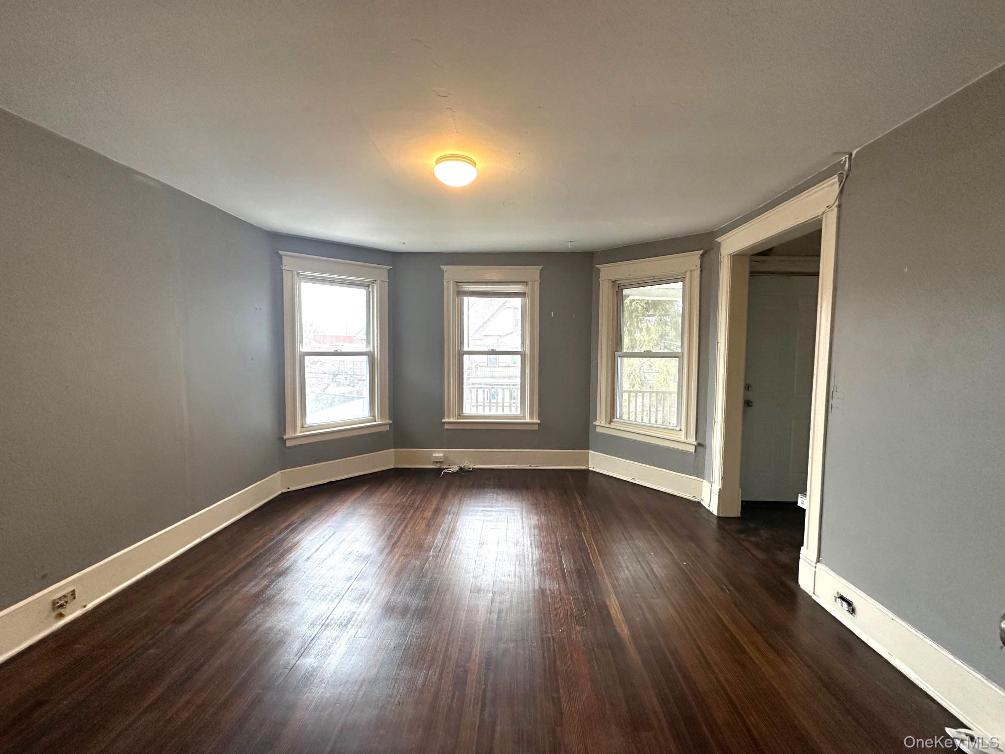 197 North Hamilton Street, Unit 2 Poughkeepsie, NY 12601 - Photo 9 of 12 Master bedroom with walk in closet and access to private front porch.