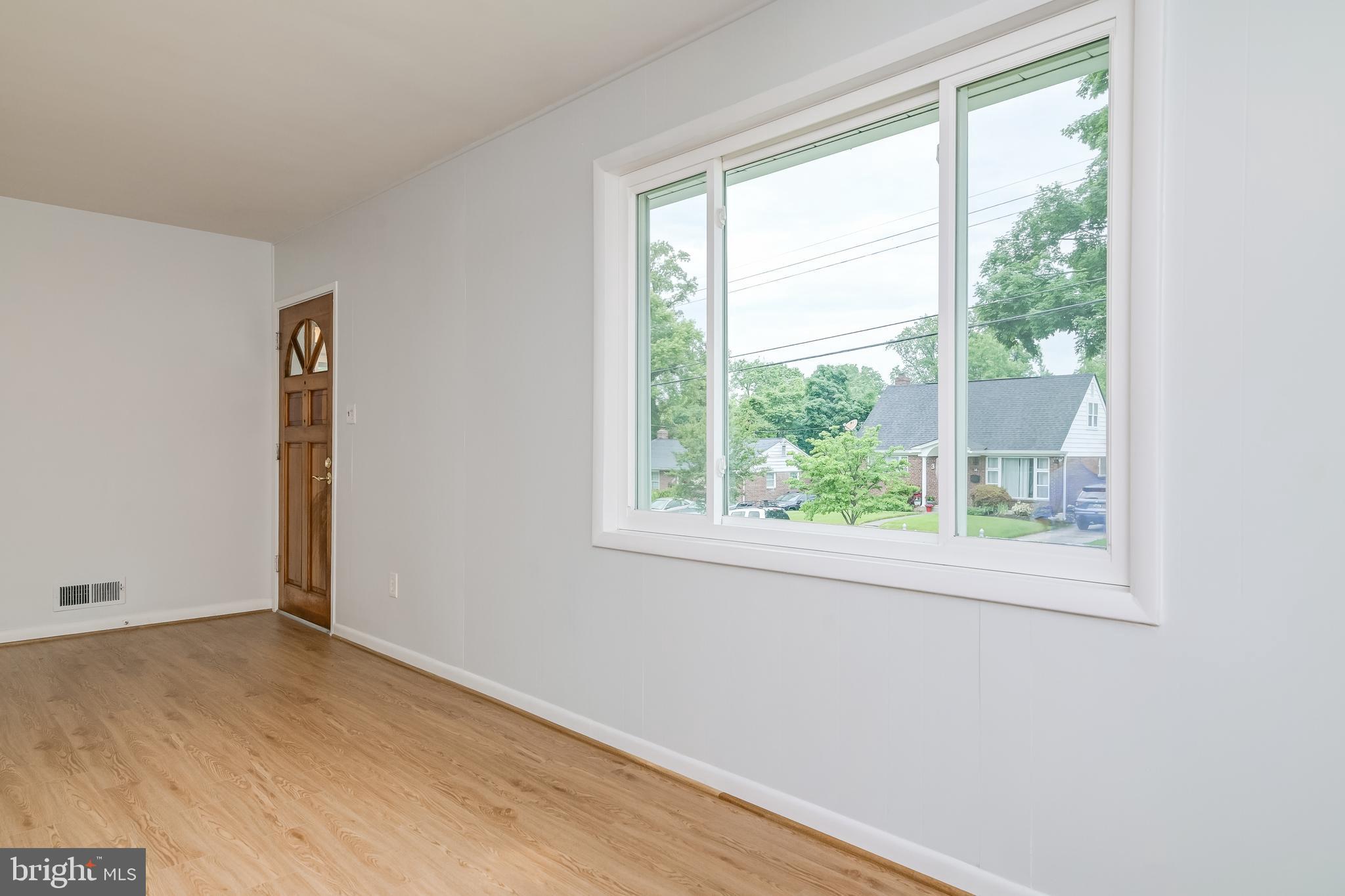 3808 Greenly Street Silver Spring, MD 20906 - Photo 13 of 52 Living room with large replacement windows