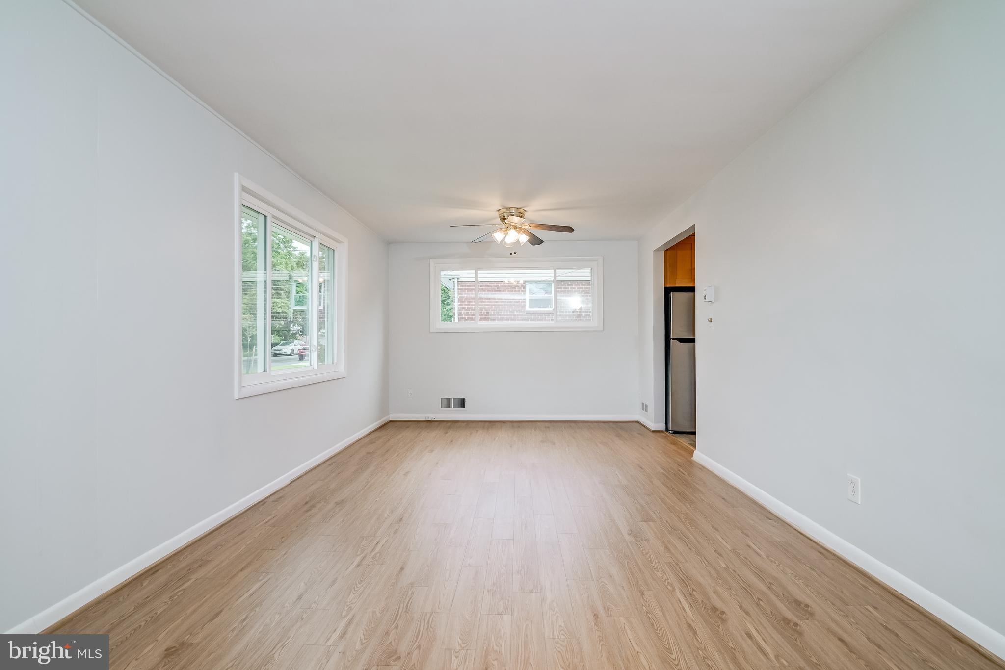 3808 Greenly Street Silver Spring, MD 20906 - Photo 15 of 52 Living Room with open Dining Area off Kitchen