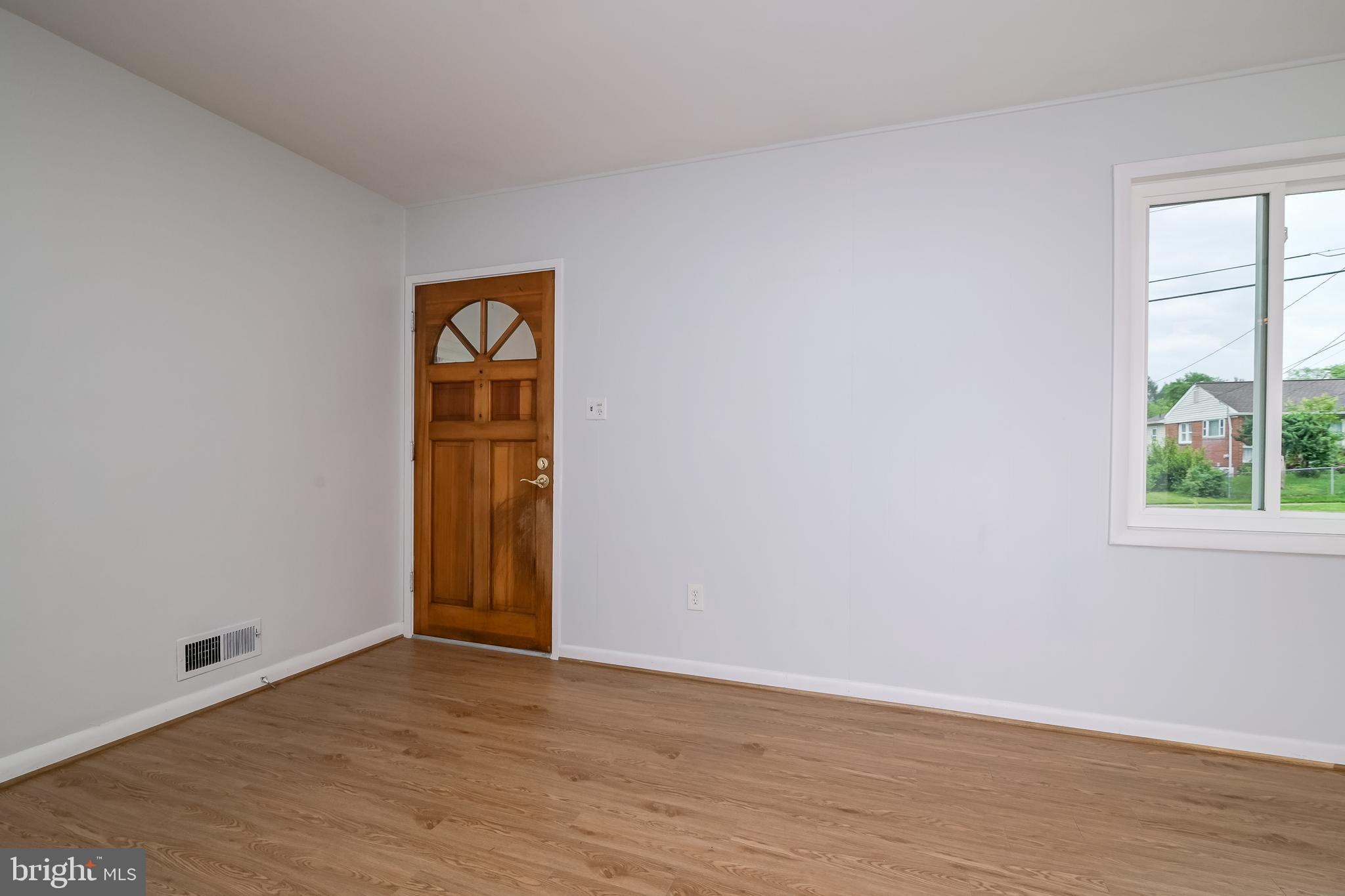3808 Greenly Street Silver Spring, MD 20906 - Photo 16 of 52 Front Door, solid wood with radial windows