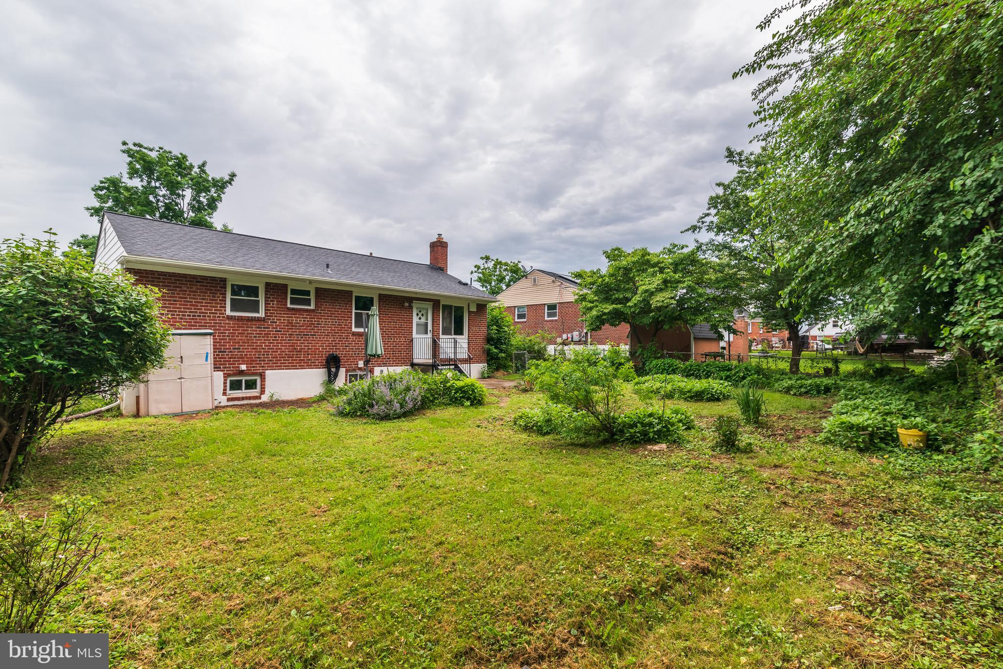 3808 Greenly Street Silver Spring, MD 20906 - Photo 41 of 52 Rear of the house. Large yard w/ chain link fence