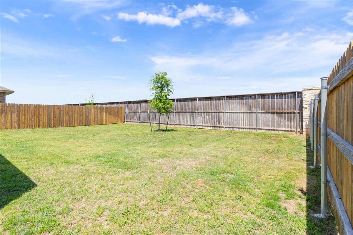 5830 Copano Road Belton, TX 76513 - Photo 34 of 34 View of yard with a fenced backyard
