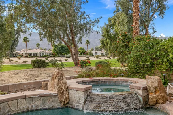 a view of a yard with an outdoor space