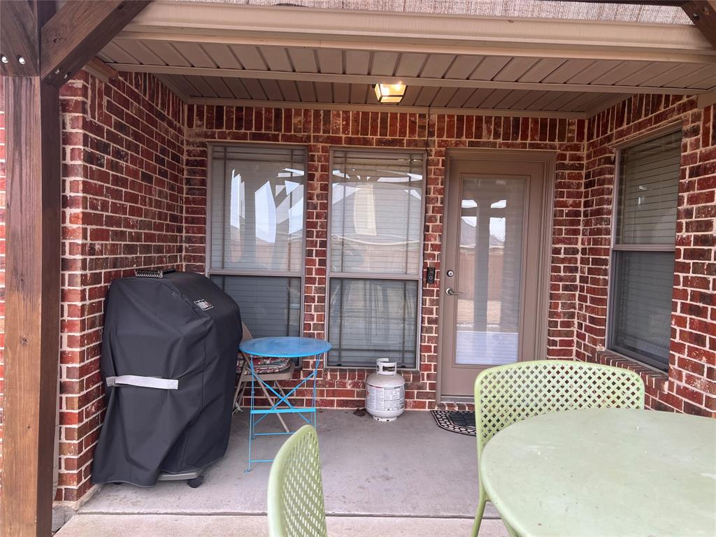 312 McAfee Street Mabank, TX 75147 - Photo 34 of 40 View of patio / terrace featuring grilling area