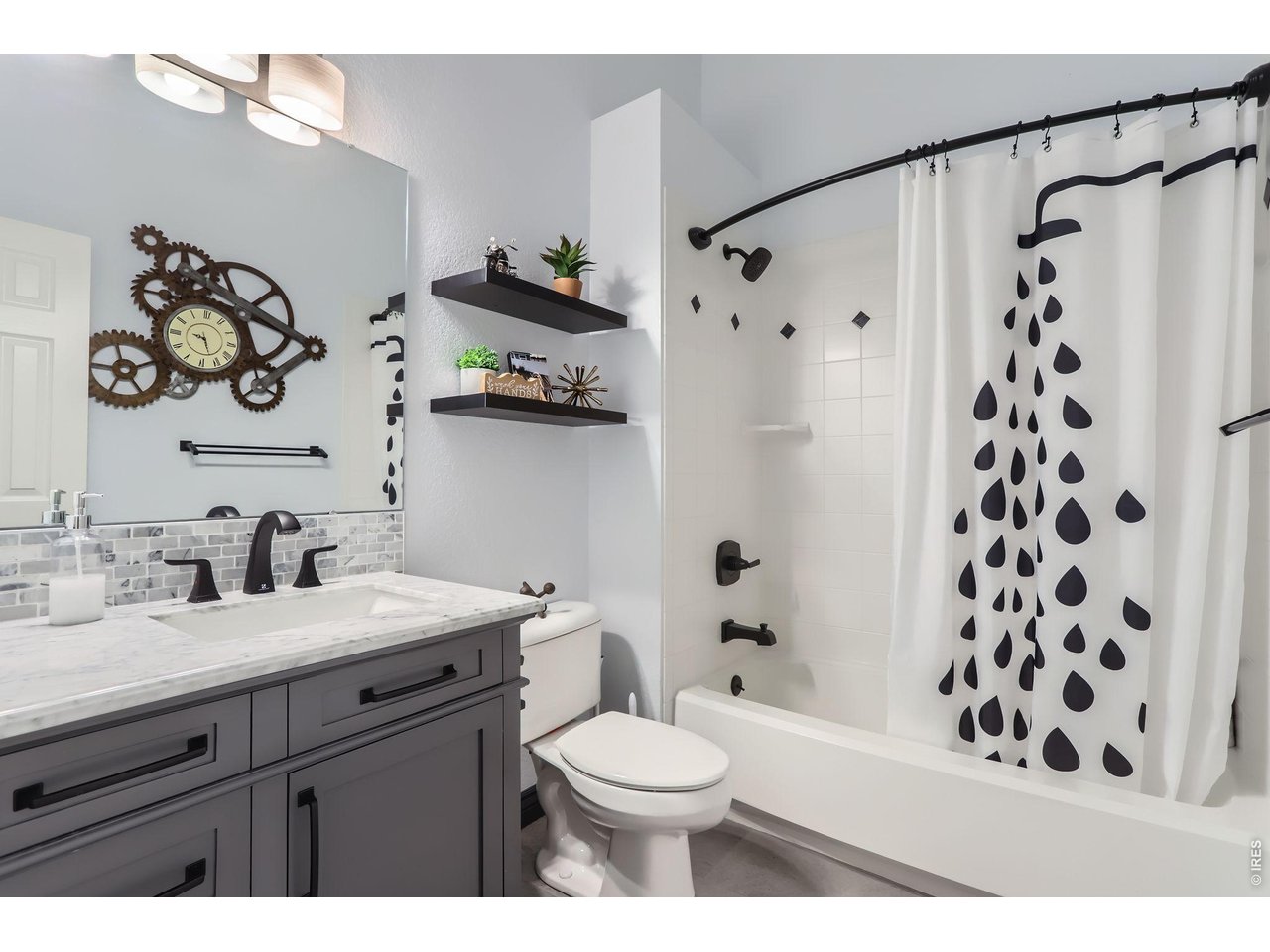 640 Valley View Road Loveland, CO 80537 - Photo 21 of 40 a bathroom with a sink and a mirror