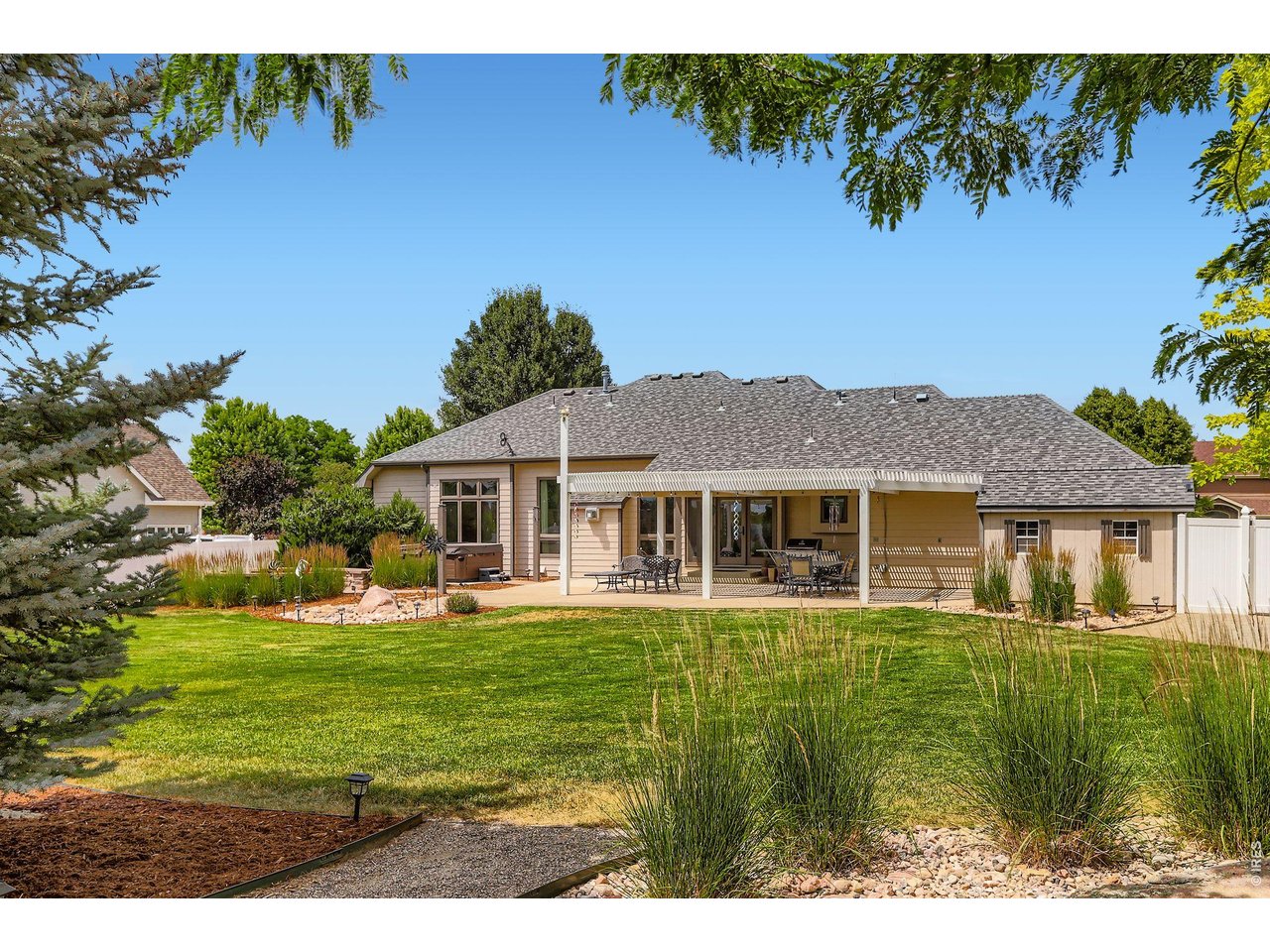 640 Valley View Road Loveland, CO 80537 - Photo 38 of 40 a front view of a house with a yard