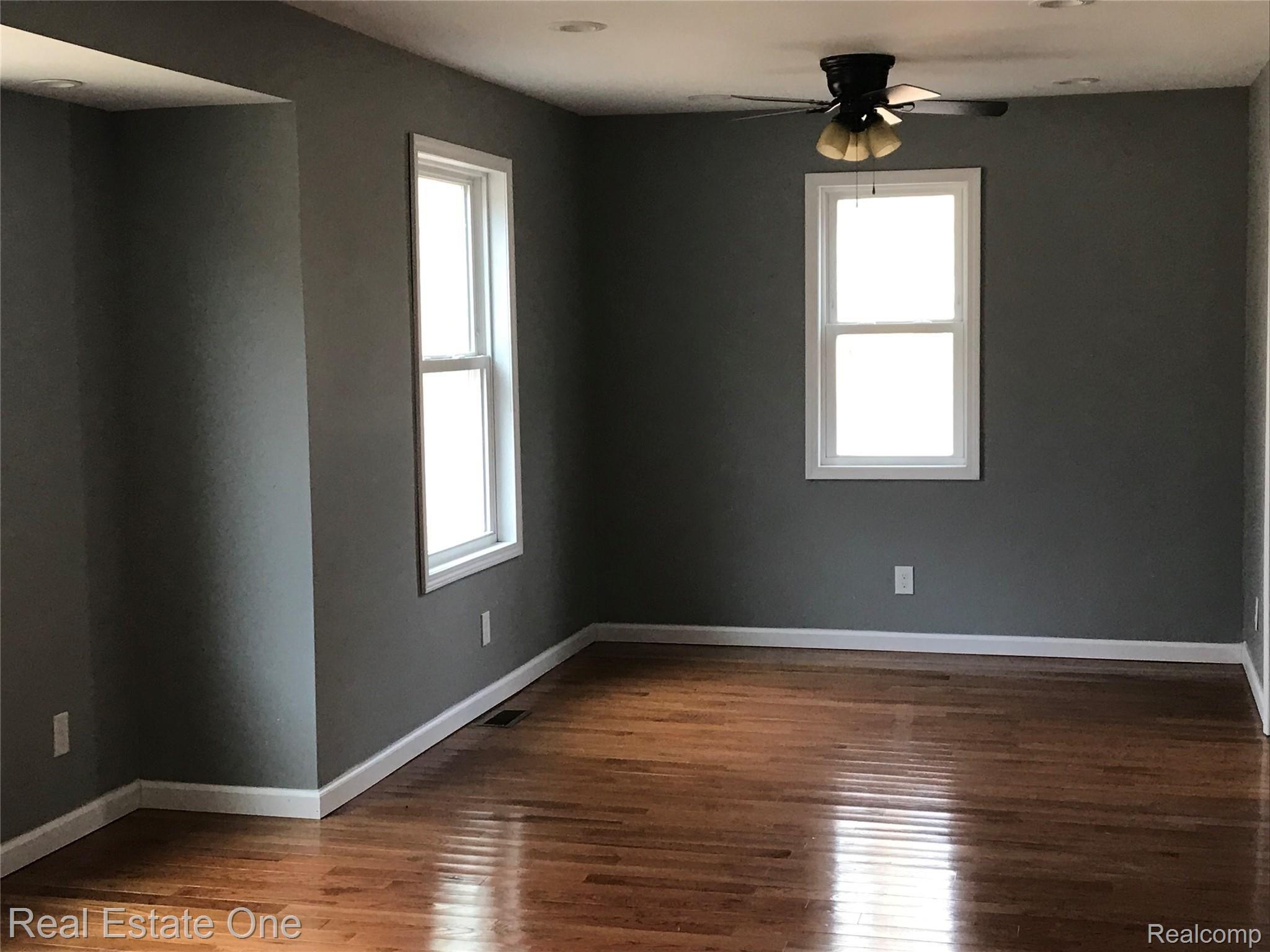 21251 Haggerty Road Belleville, MI 48111 - Photo 5 of 19 Dining/living room. Lot's of pot lighting.
