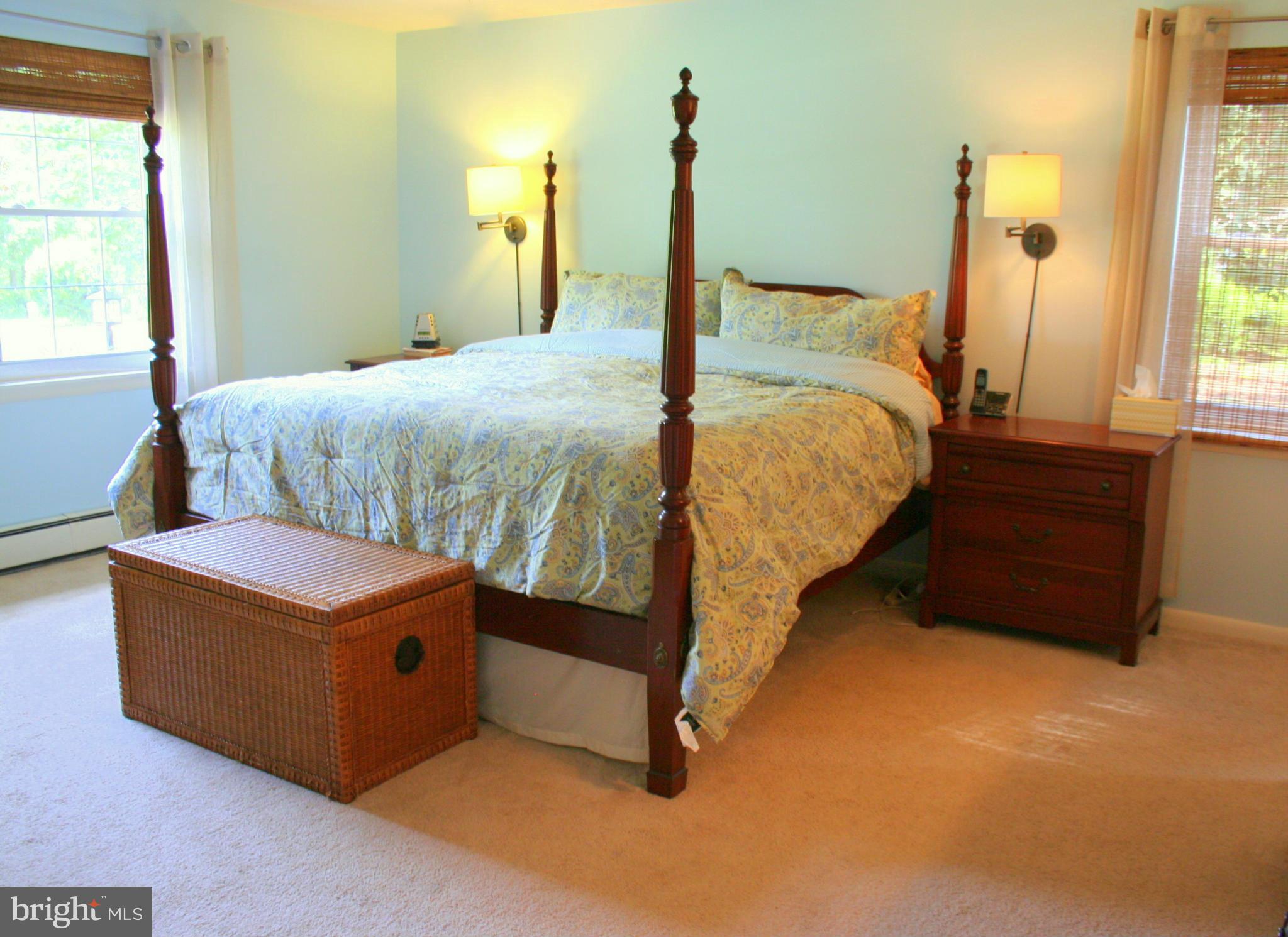 2901 Stockton Road Phoenix, MD 21131 - Photo 13 of 29 a bed sitting in a bedroom next to a window