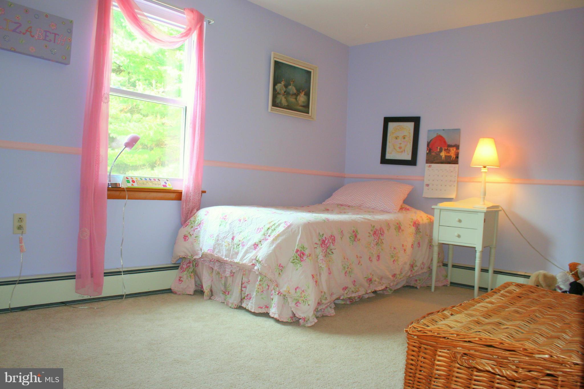 2901 Stockton Road Phoenix, MD 21131 - Photo 18 of 29 a bedroom with a bed and a window